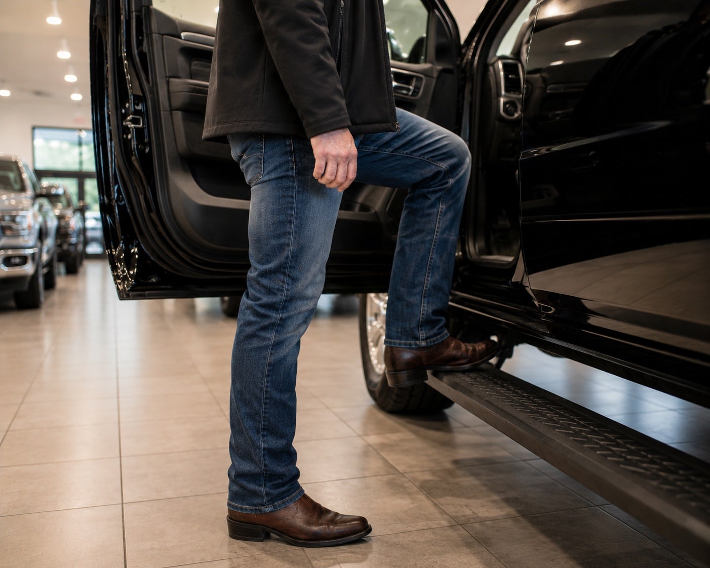 Customer shopping for a Ram truck at Deacon Jones Chrysler Dodge Jeep Ram of Clinton